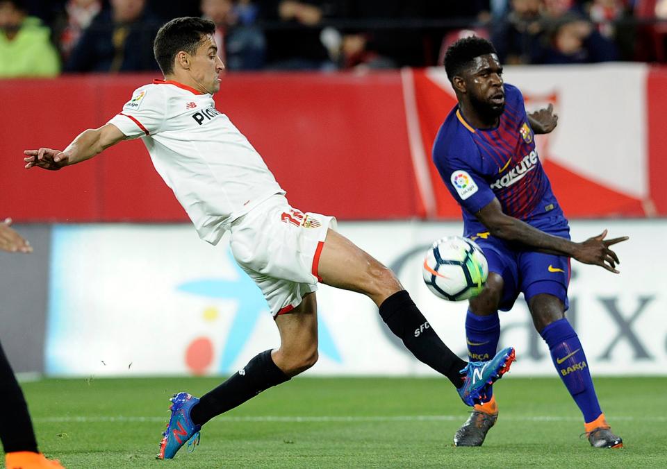  Samuel Umtiti, right, has been a key part of the Barcelona side that have marched to the top of La Liga this term