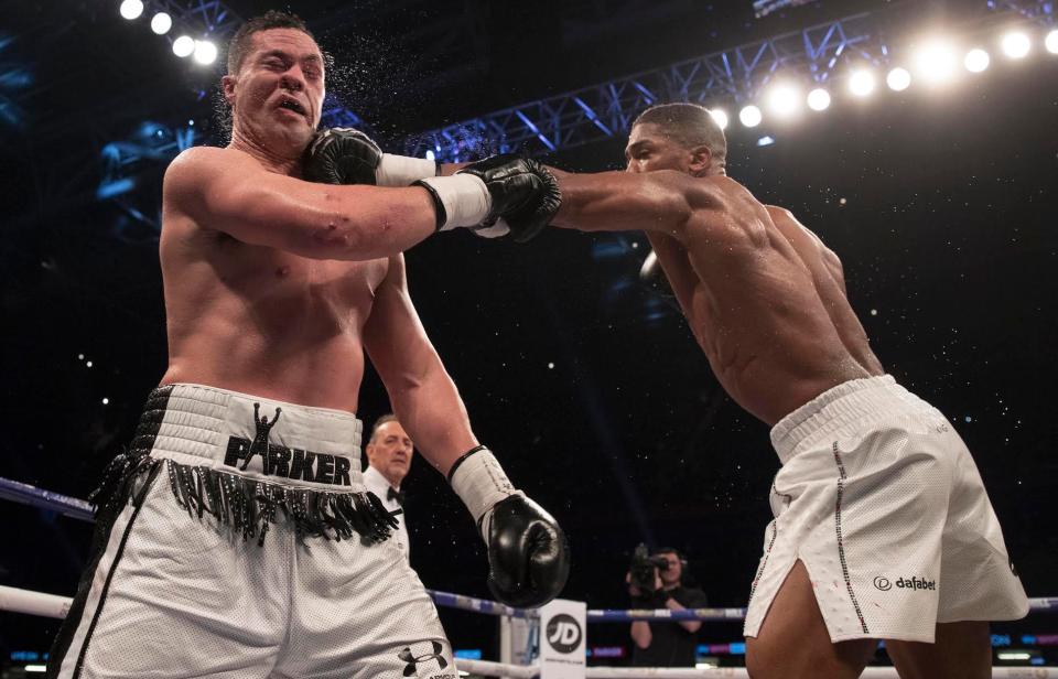  Anthony Joshua delivers a left jab into the chin of Joseph Parker