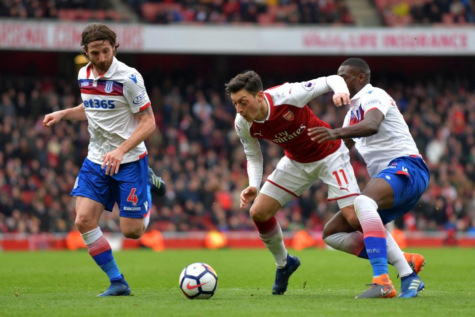  Mesut Ozil played his part in the 3-0 victory by winning a highly controversial penalty