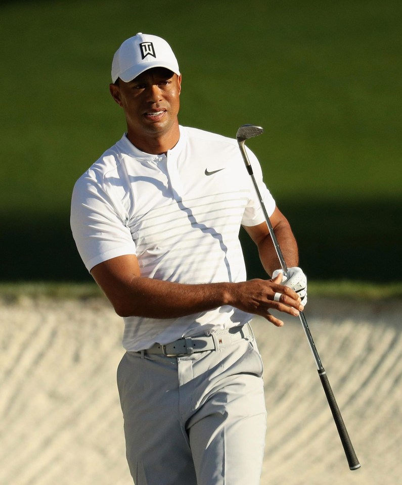 Tiger Woods, who is set to compete in the Masters tournament that starts on Thursday, has reportedly threatened to release 'embarrassing photos' of Kristin Smith