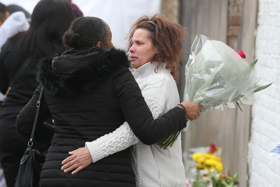  Grieving family members embraced at the scene