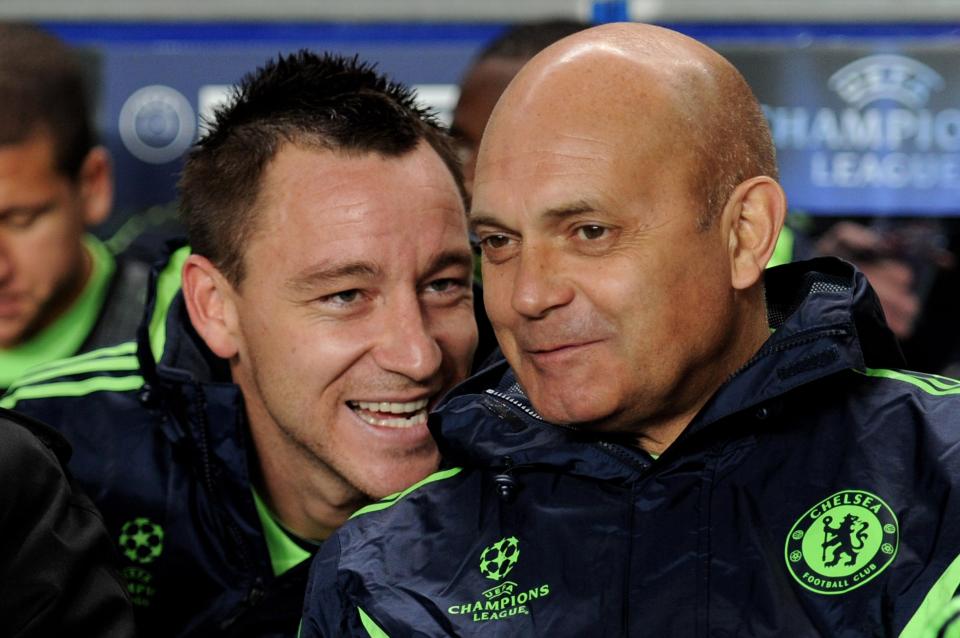  Wilkins shares a joke with former Chelsea captain John Terry while he was assistant coach at the West London club