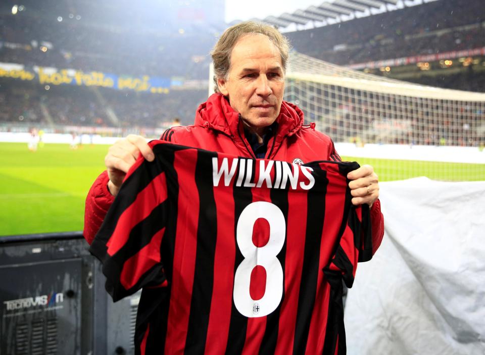  Franco Baresi pays tribute to Ray Wilkins before match by holding up shirt