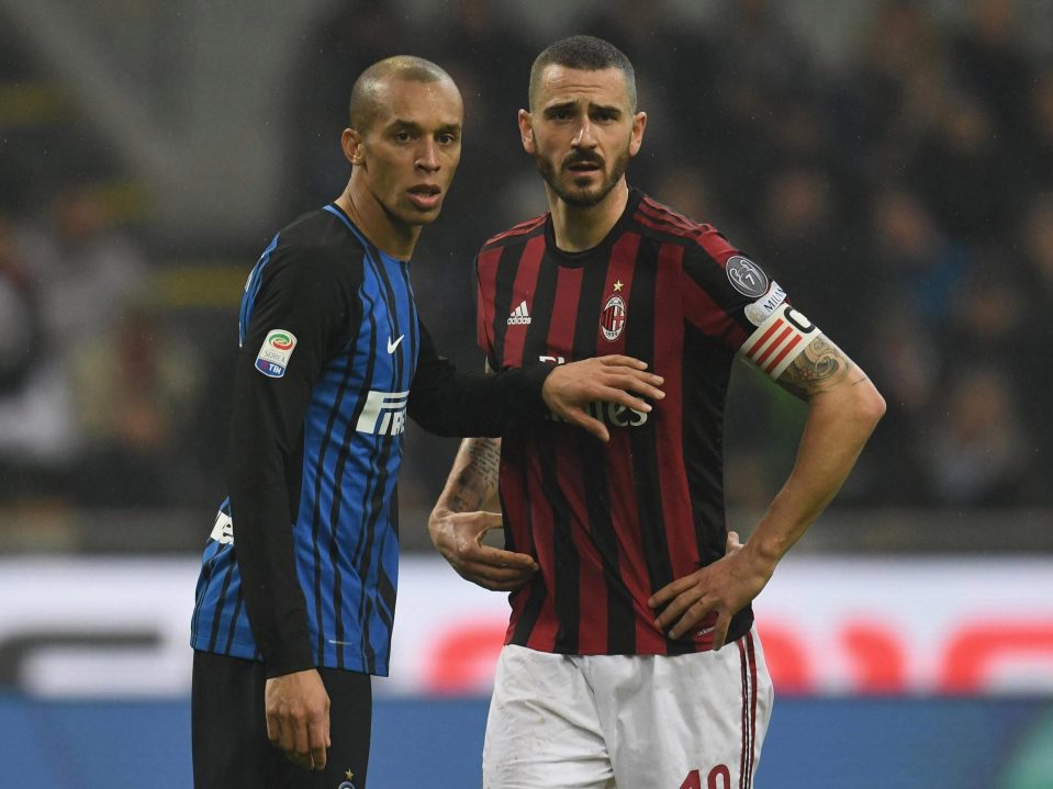  Miranda watches Leonardo Bonucci closely during Milan derby at San Siro