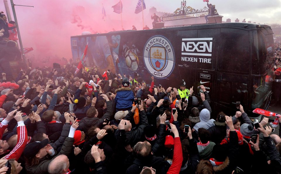  The Manchester City team bus was damaged after it was pelted with bottles and other missiles by Liverpool fans