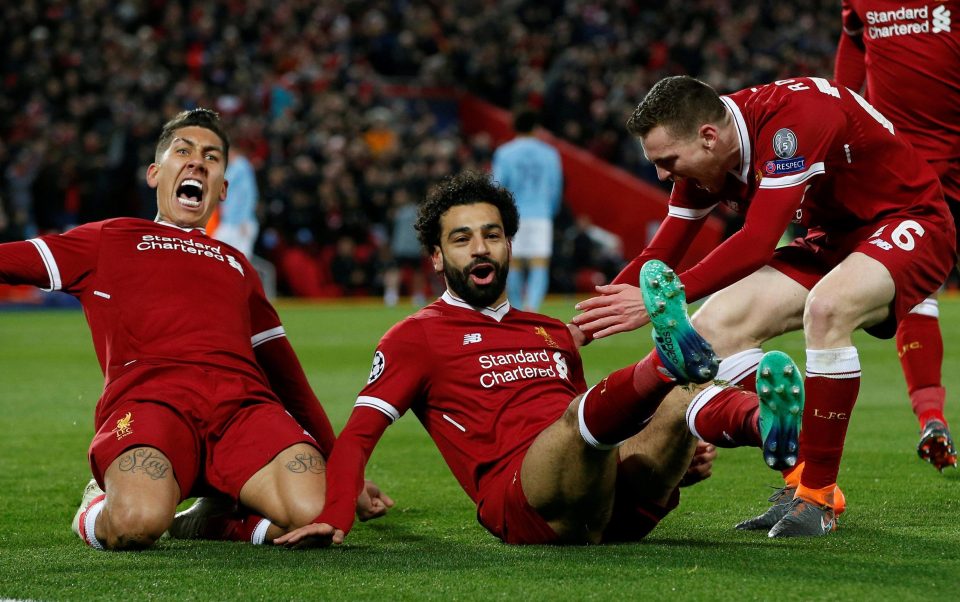  Roberto firmino and Andrew Robertson join scorer Mo Salah to celebrate an opener that sparked an awesome three-goal blast