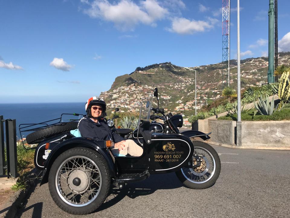  Carol Bielfeld in a side-car, which she describes as the perfect way to take a whistle stop tour