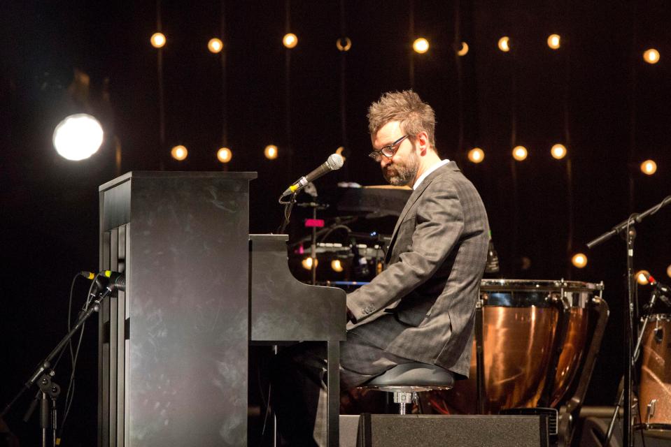  E plays the piano during a concert at the Tempodrom in Berlin, 2014