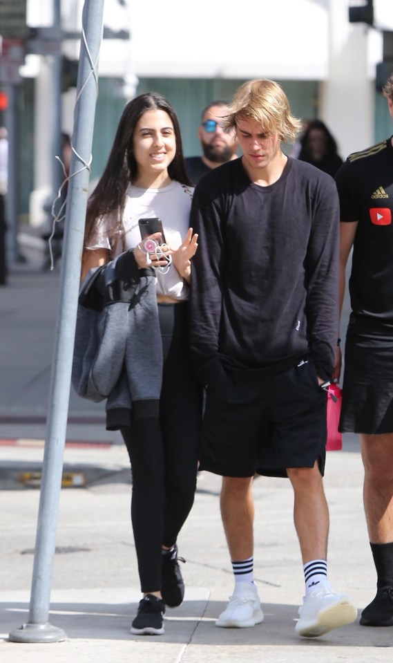 Justin Bieber was seen looking close to a mystery brunette who resembles Selena Gomez