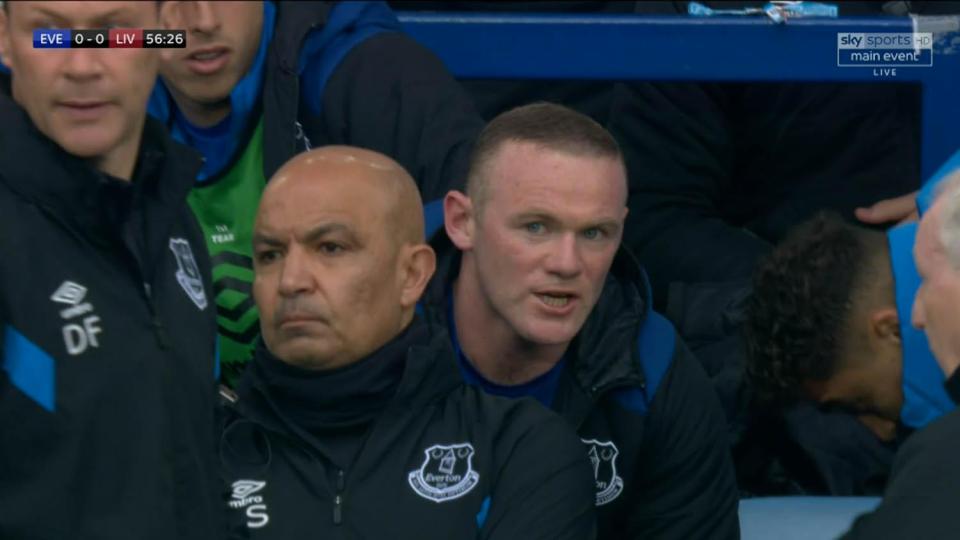  Wayne Rooney seemed to utter expletives as he took his seat back in the dugout in the second half