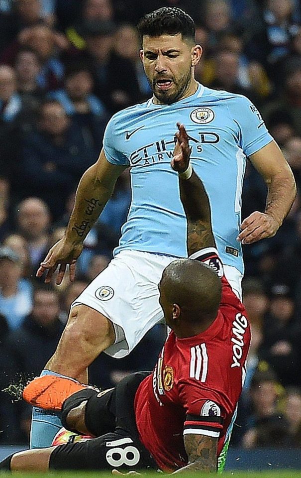  Young had his moments, though - including this horror tackle on Sergio Aguero