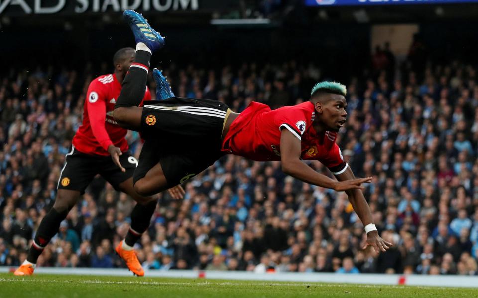  Paul Pogba scored twice as Man United came from behind to beat City