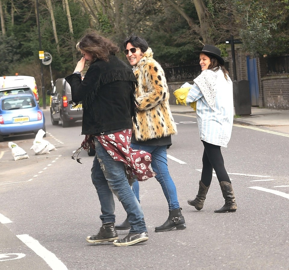 They all had smiles on their faces as they crossed the road together