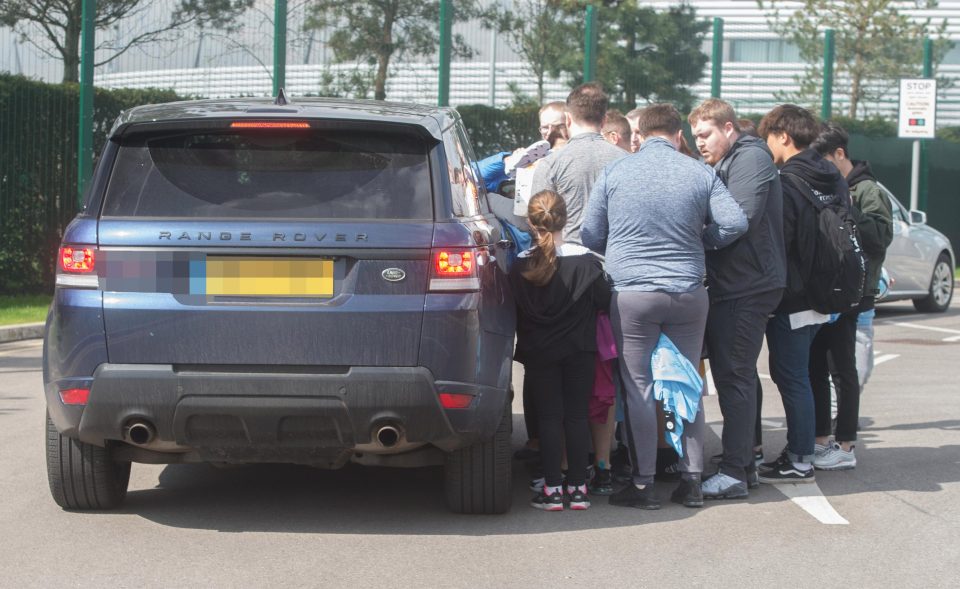  Fans gather round the Range Rover of Kevin De Bruyne, who is many people's favourite to be named player of the year