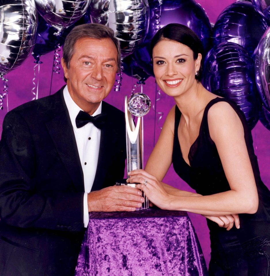  Des O'Connor and Melanie Sykes were behind the podium in 2003