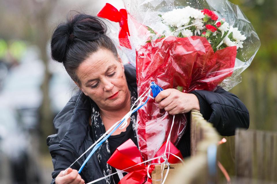  Vincent's aunt patiently re-tied the floral tributes after they were twice trashed by a vigilante