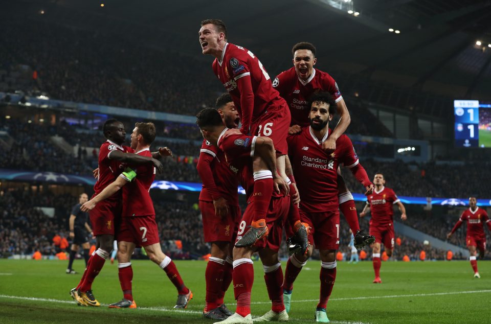  Liverpool players celebrate reaching the Champions League semi-finals