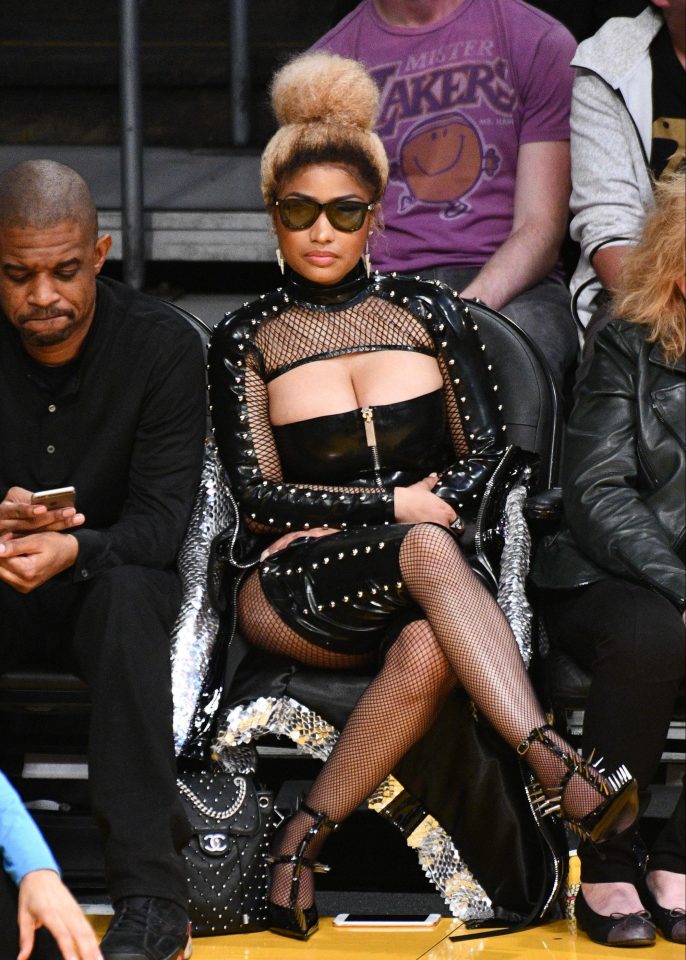  The star sported a bondage-inspired outfit to watch a basketball game just days ago