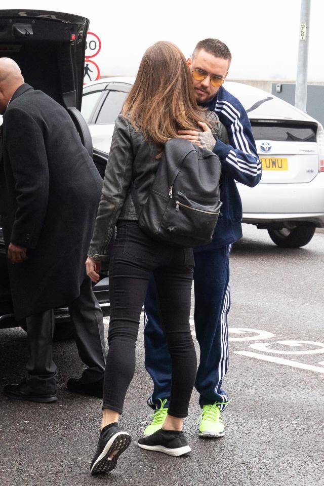  Liam hugged a female pal as he made his way out of the car