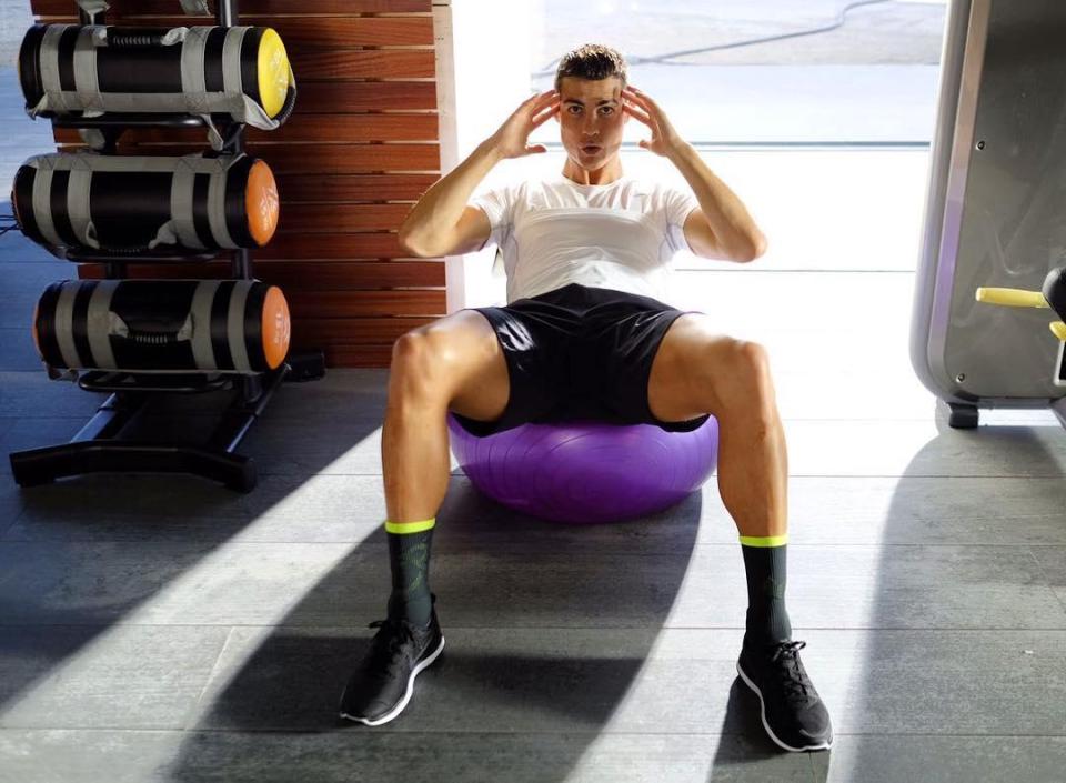  Cristiano Ronaldo's ripped abs come through a number of workouts including sit-ups and work on an exercise ball