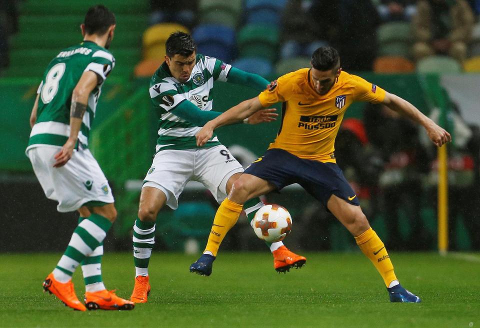  Koke in action against Marcos Acuna at the Estadio Jose Alvalade