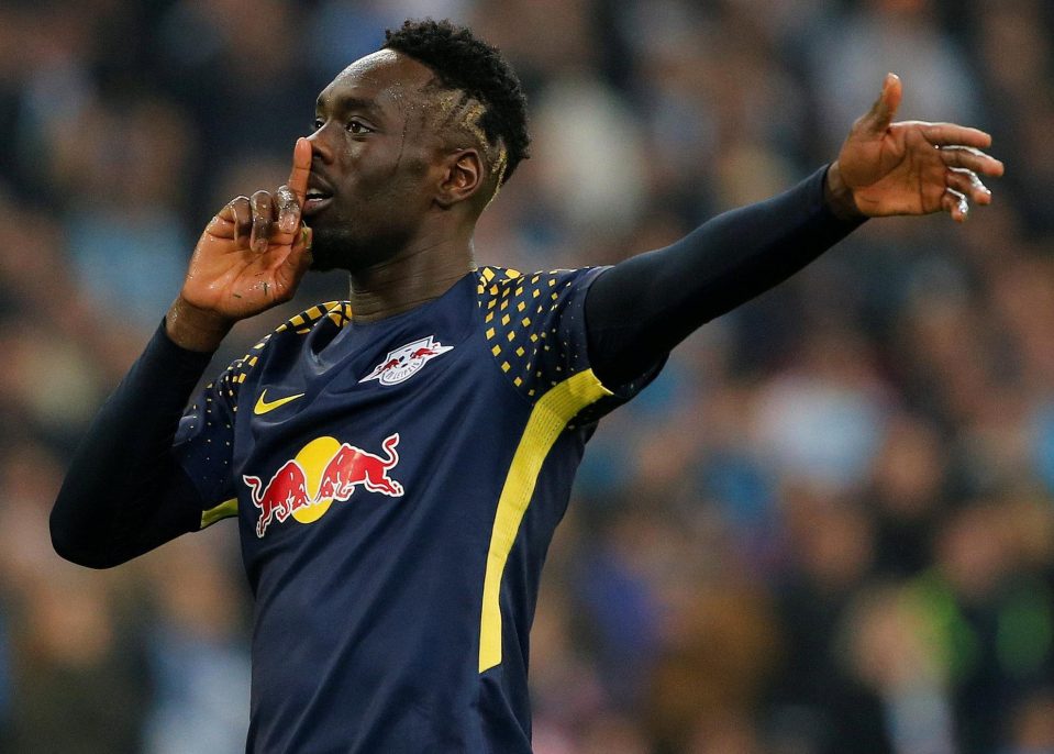  Jean-Kevin Augustin salutes his goal to briefly cut the Leipzig deficit to 3-2