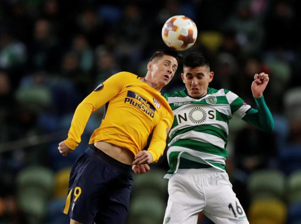  Fernando Torres challenging for a head with Rodrigo Battaglia