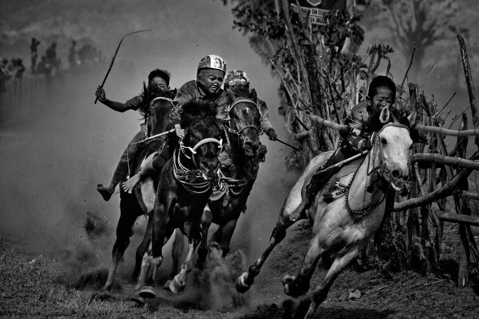  Alain Schroeder's black-and-white image of young Indonesian jockeys competing in a horse race took out the sports prize