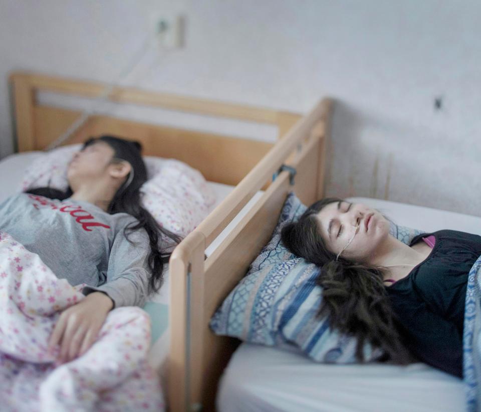  Two girls bedridden with 'resignation syndrome' were the subject of an image by Magnus Wennman in the people category. One of the girls has been bedridden and unresponsive for two years, the other six months