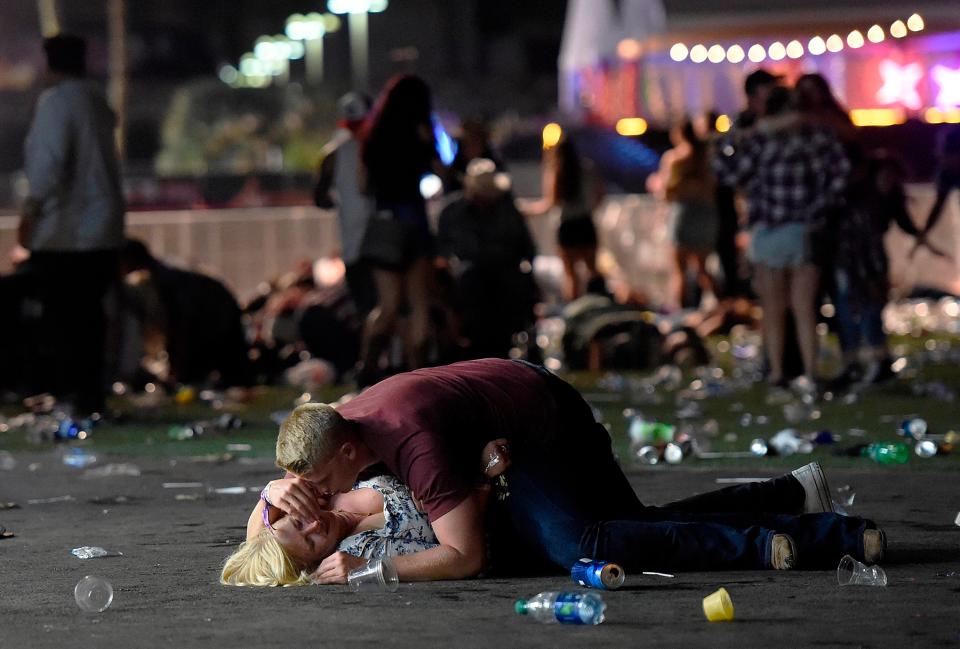  David Becker's heartbreaking shot of a couple at the mass shooting in Las Vegas in 2017 won the Spot News Stories award