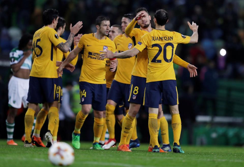  Atletico players celebrating after the final whistle at Estadio Jose Alvalade