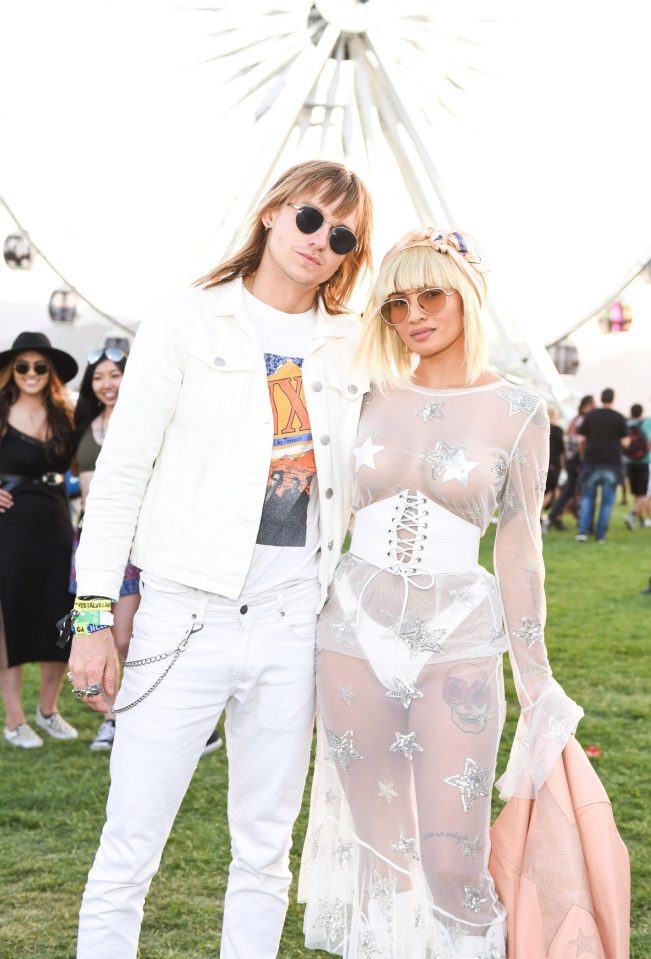  See-through and white are the themes of this couples mismatched outfit