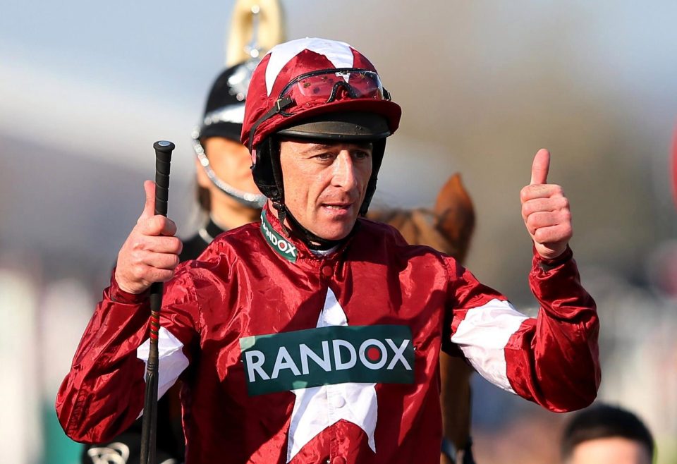  Davy Russell gives the thumbs up after winning the big race of the year - but admitted he was nervous before the result was confirmed