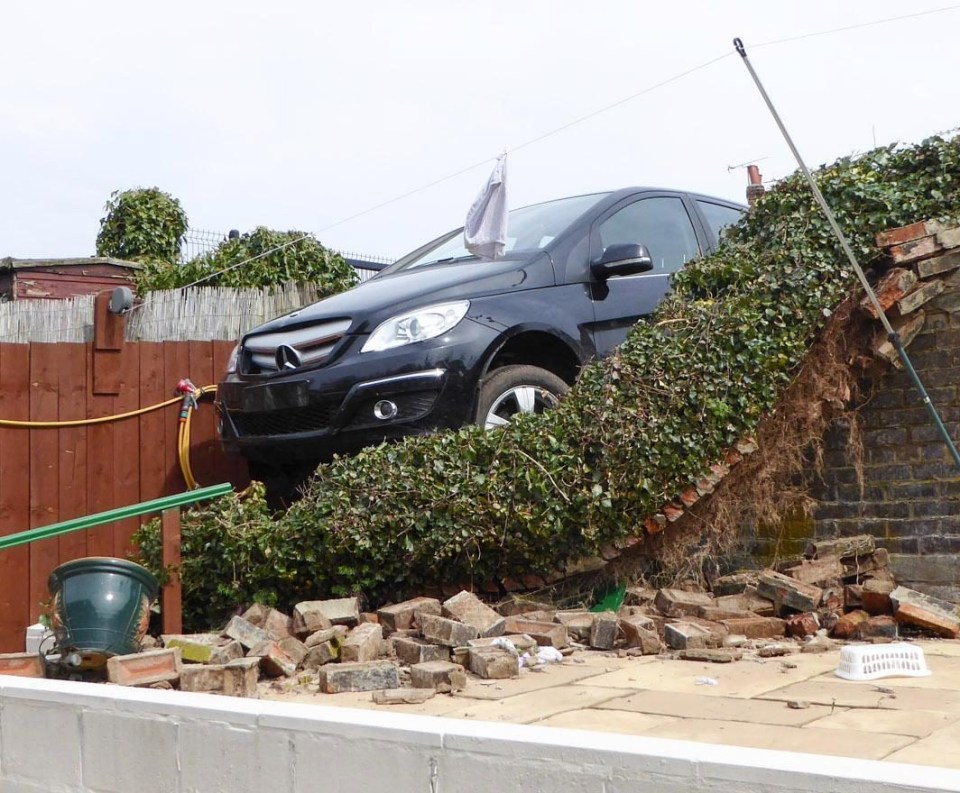 She had just moved out of the path of the SUV when it crashed through