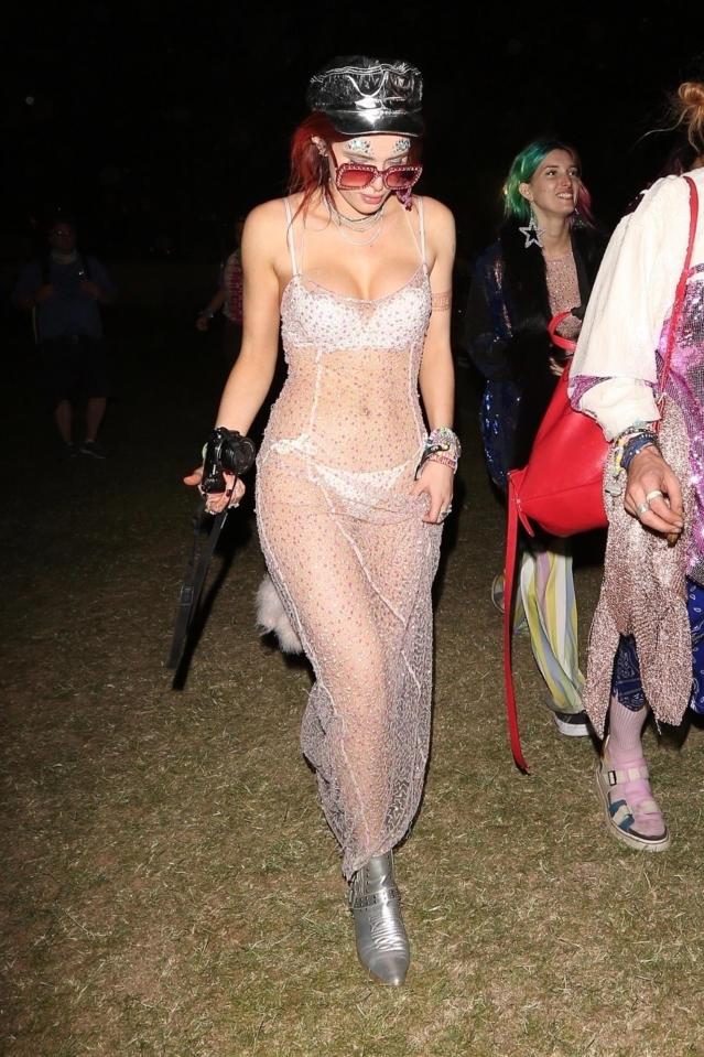  Bella Thorne's raunchy dress bared all in an interesting match of silver, pink and black accessories