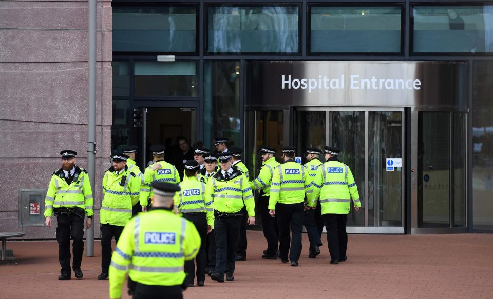 Cops arrive outside the entrance of Alder Hey Children's Hospital as demonstrators chant outside