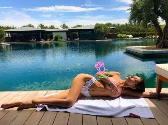 Bella Hadid looked like a goddess as she sprawled out on the deck