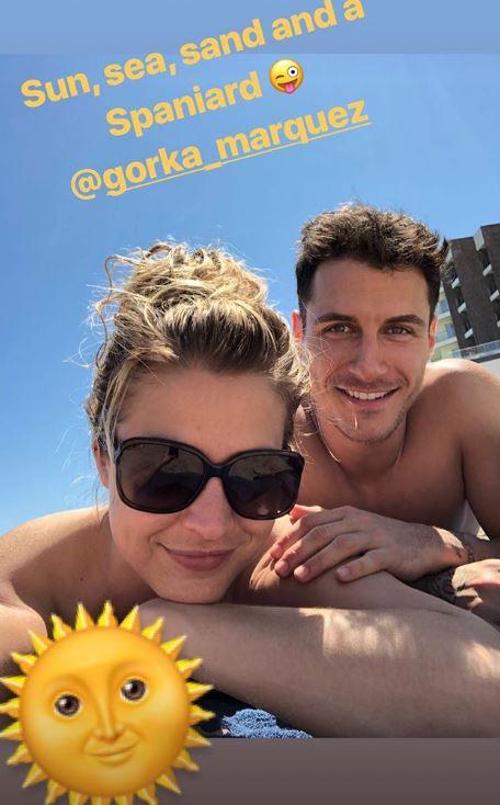  They are currently soaking up the sun on holiday in Spain