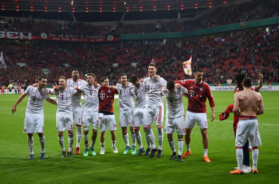  Bayern Munich celebrate in front of their jubilant supporters and will now face either Schalke or Eintracht Frankfurt in the final