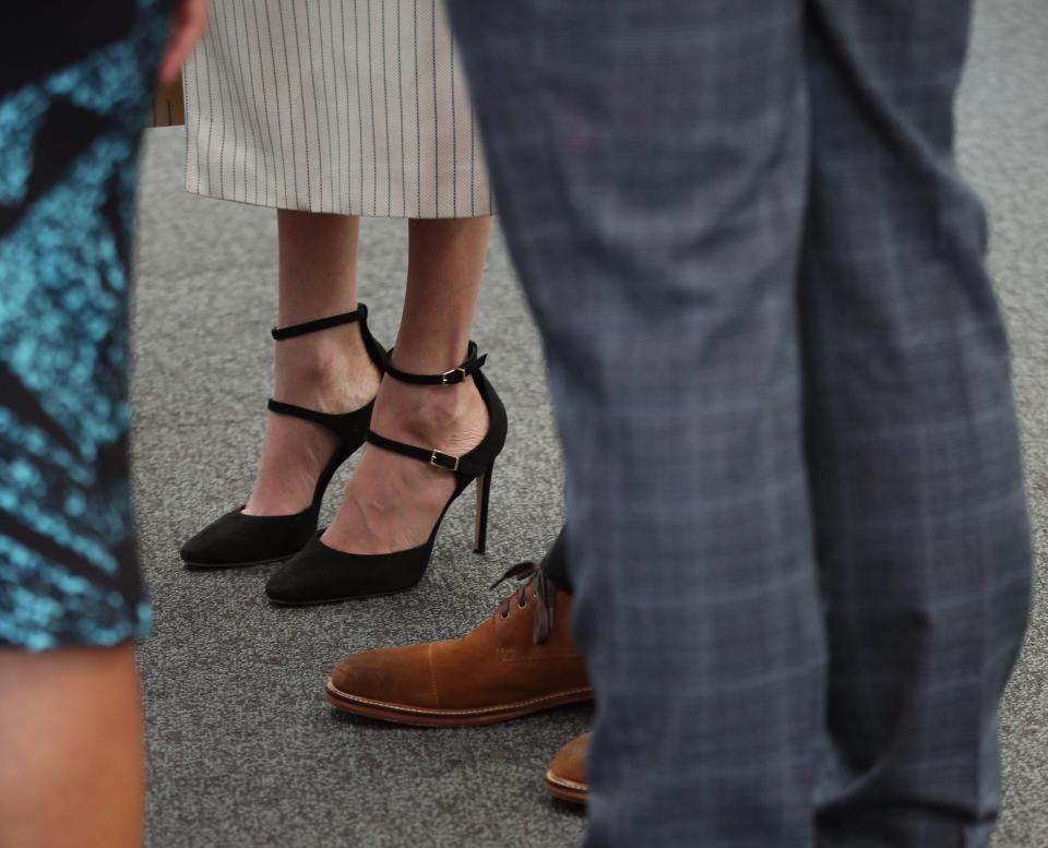  Markle wore a pair of her trademark heels, with this pair costing £334