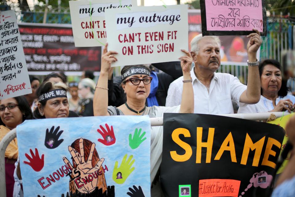  Indian filmmaker Aparna Sen stands with activists from various organisations during a silent protest campaign against the murder of a girl in Kathua