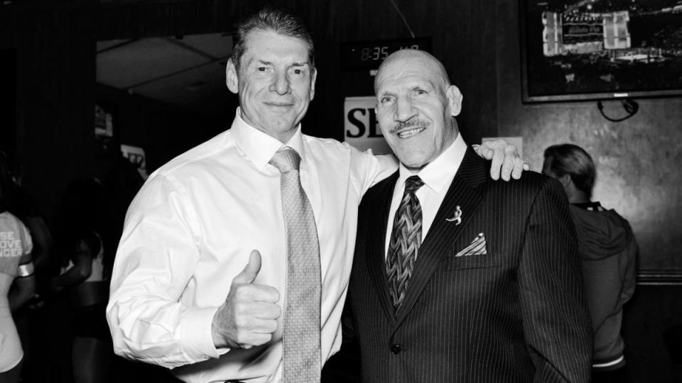  WWE owner Vince McMahon posing with the late Bruno Sammartino