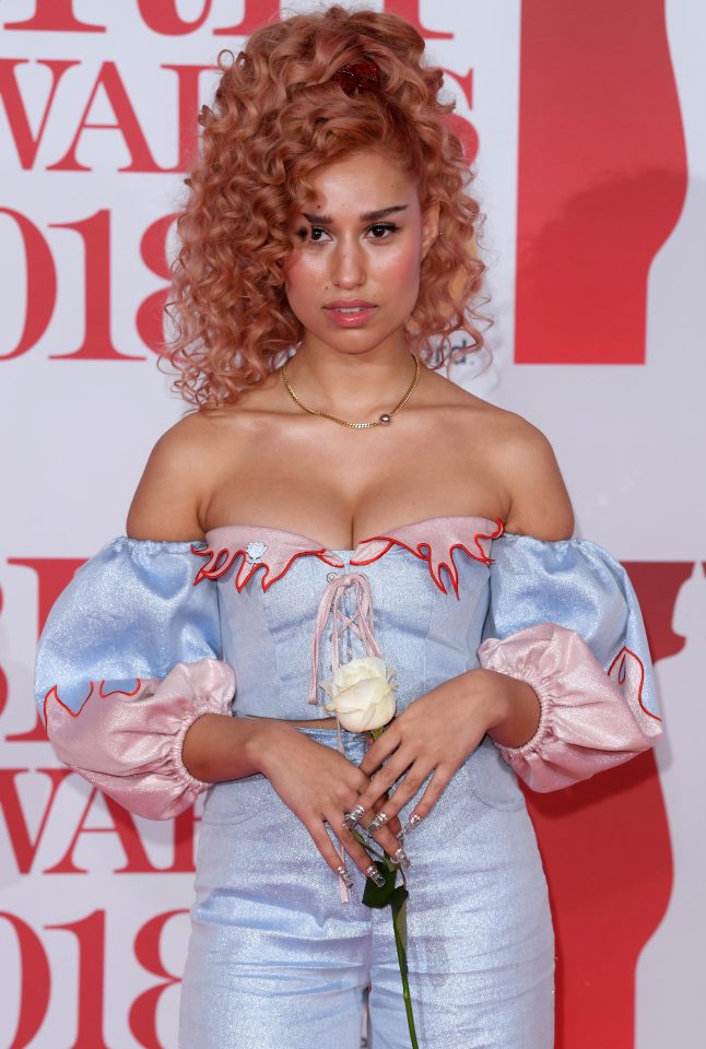  Singer Raye has accused a posh London restaurant of 'blatant racism' in a row over dress code