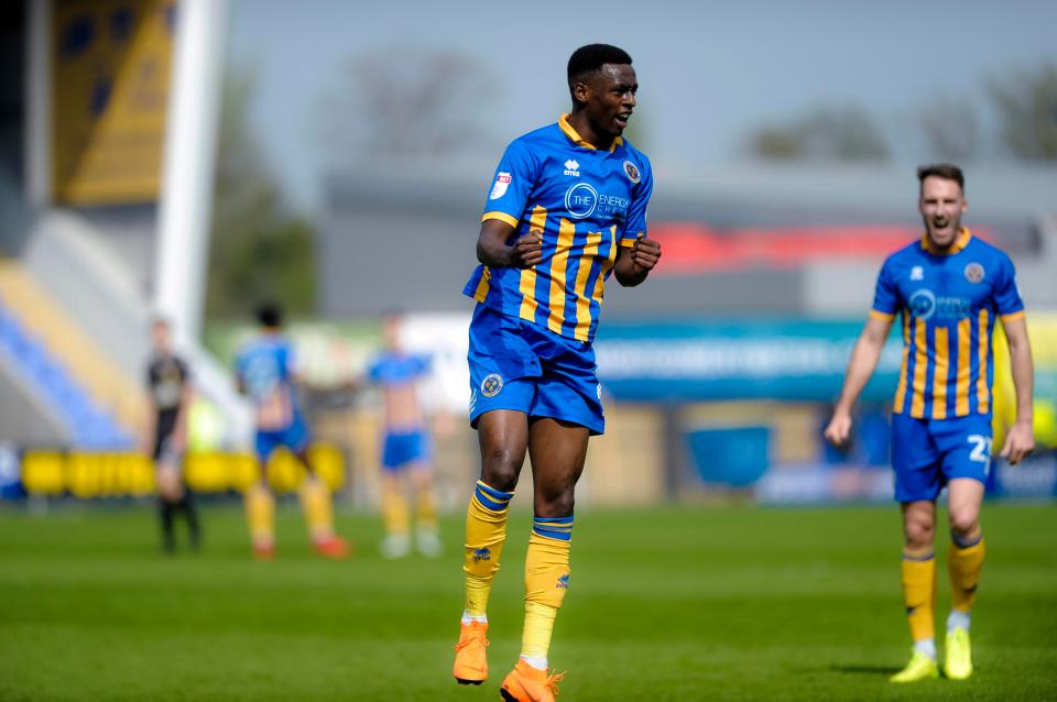  Shrewsbury winger Abo Eisa, 21, celebrates after opening the scoring against Bury for his first Salop goal