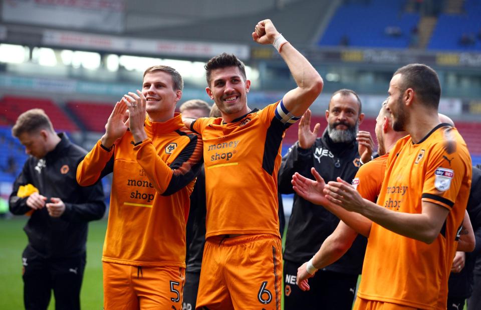  Danny Batth and Ryan Bennett cheer their side at the Macron Stadium