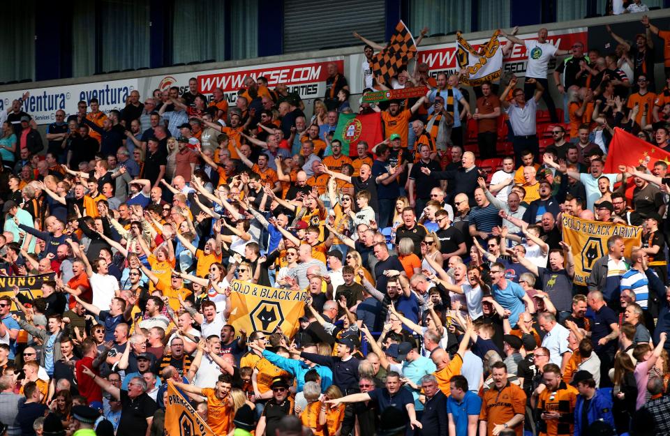  Wolves fans celebrate after the final whistle