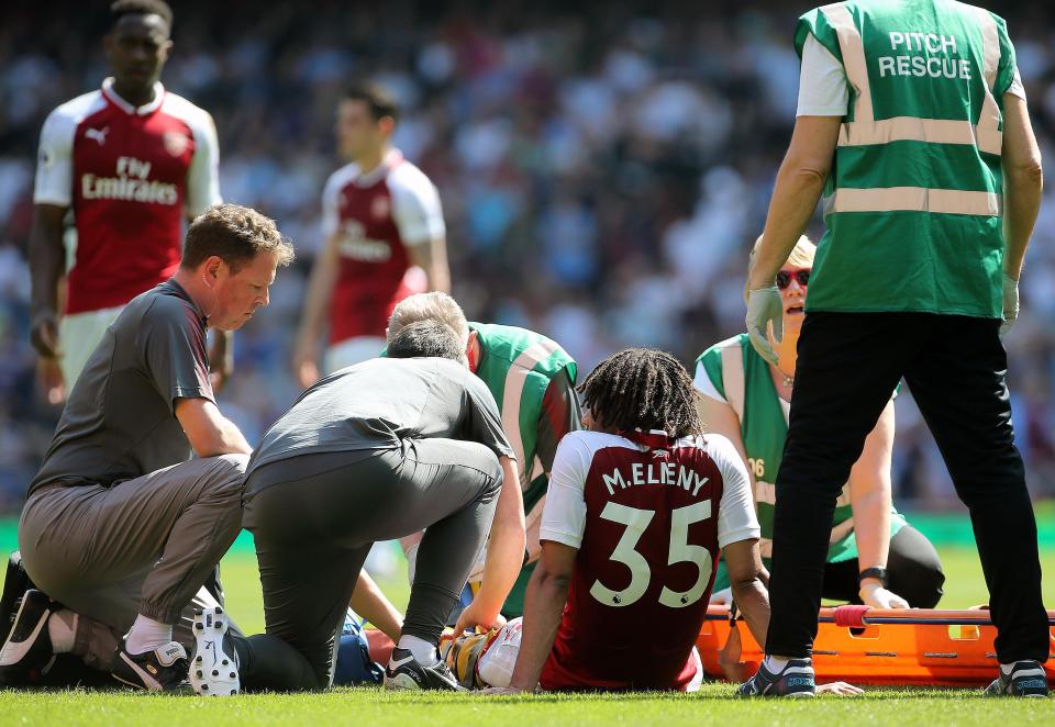 Elnenys ankle had to be strapped up immediately before he was lifted on to a stretcher