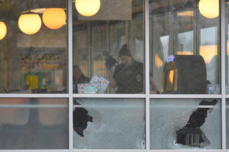  Bullet holes in the window at the Waffle House restaurant near Nashville, Tennessee