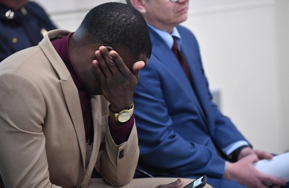  Shaw Jr wipes away tears as he attends a press conference about the shooting