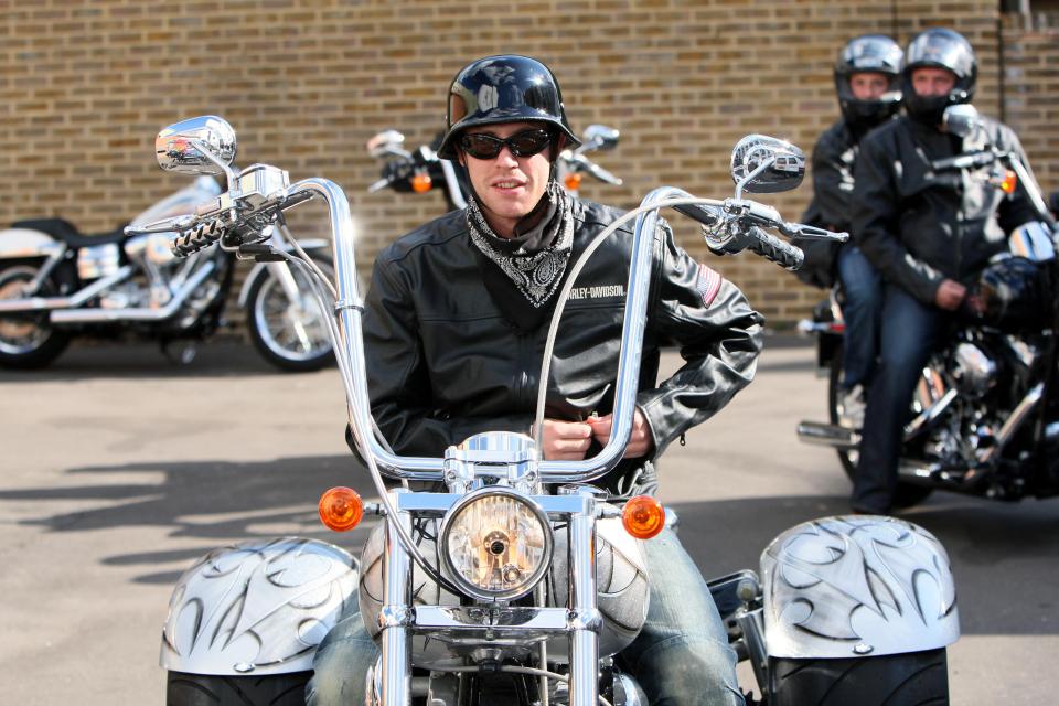  Wayne Bridge poses on his Harley-Davidson